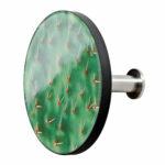 Appendiabiti a forma circolare della collezione Art-Up con pomello in acciaio inox e appendiabiti HPL rivestito in resina con grafica colorata foglia di cactus