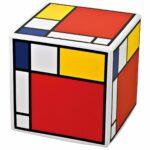 Pouf rigido a cubo in ecopelle con grafica in stile Mondrian