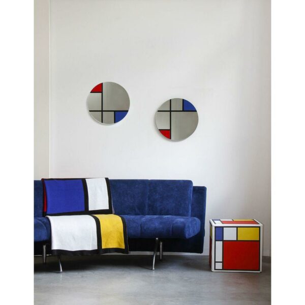 Specchio in vetro circolare con grafica ispirata a Mondrian