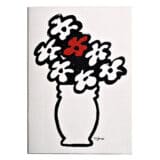 quaderno per appunti con in copertina un vaso di fiori